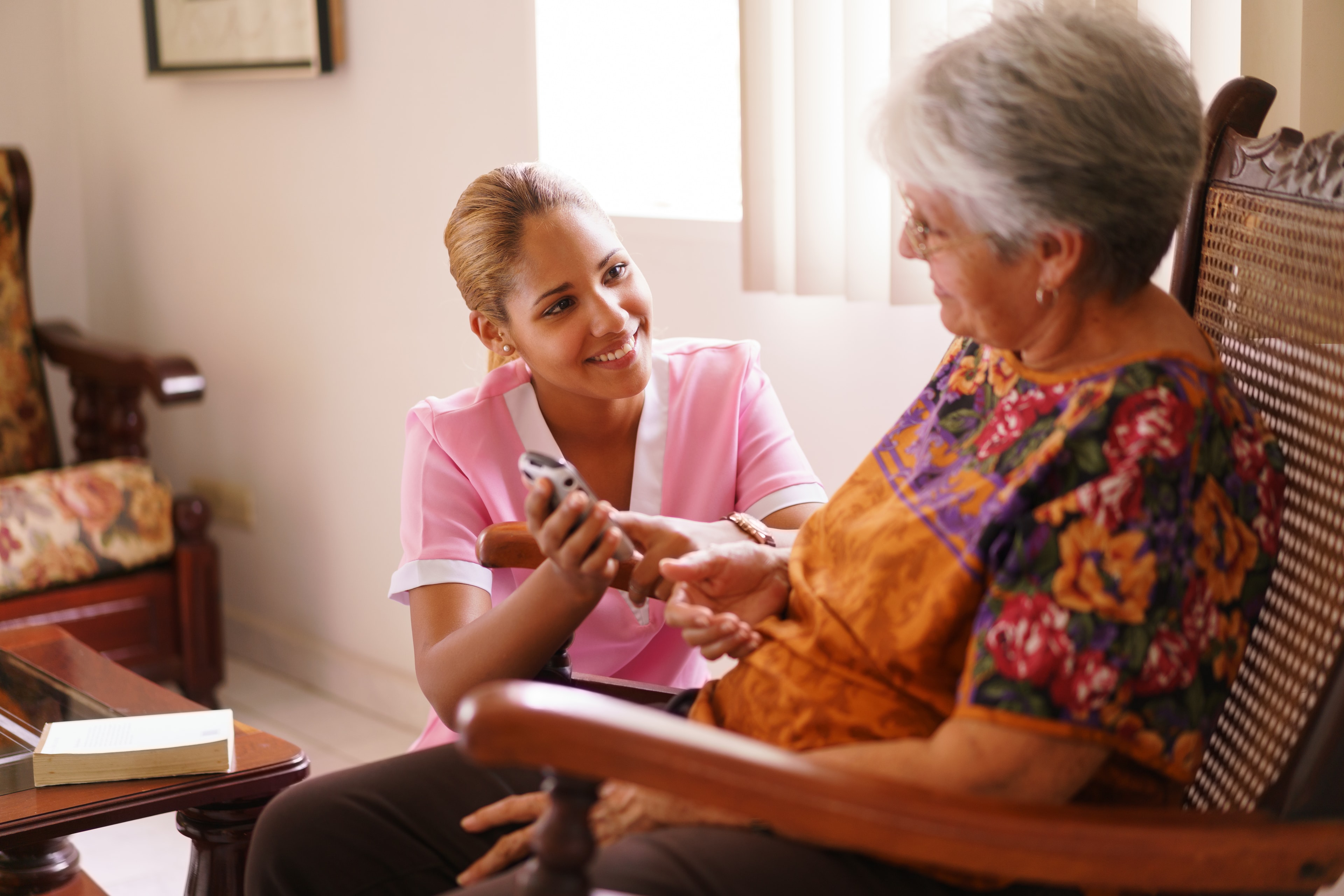Hospice caregiver providing attentive care near Groves, TX
