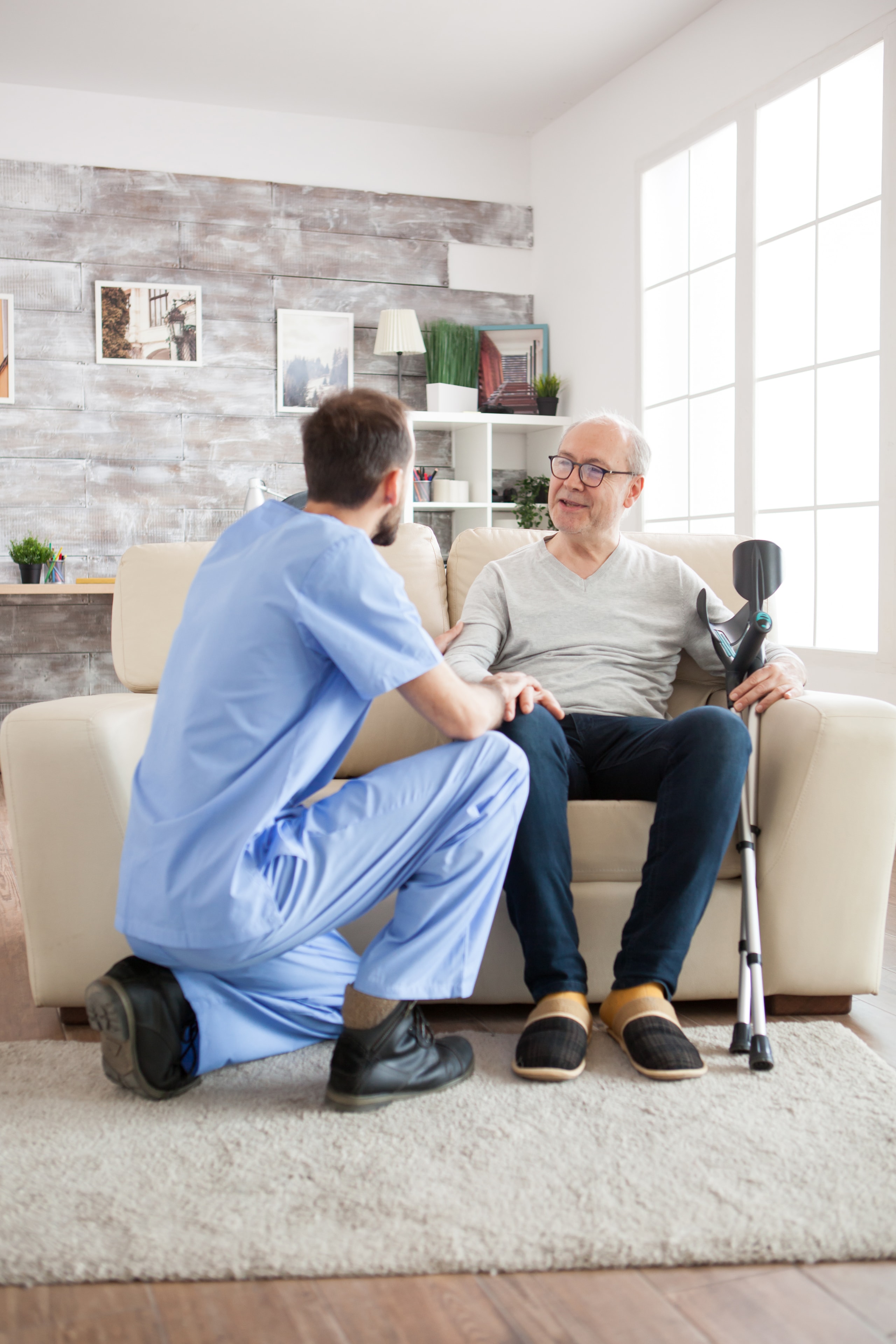 Hospice nurse consulting with a patient