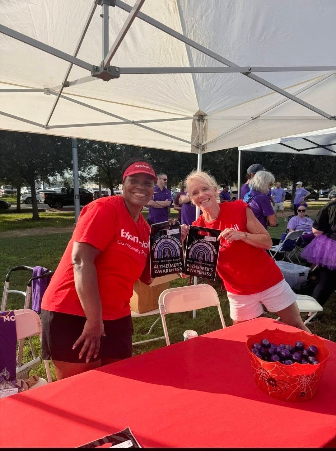 Alzheimer’s Awareness booth volunteers at the Walk to End Alzheimer’s